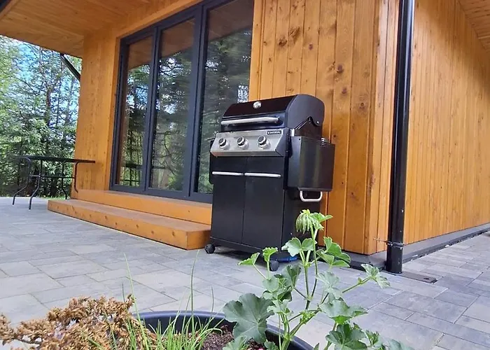 Dağ evi Domki Krynica